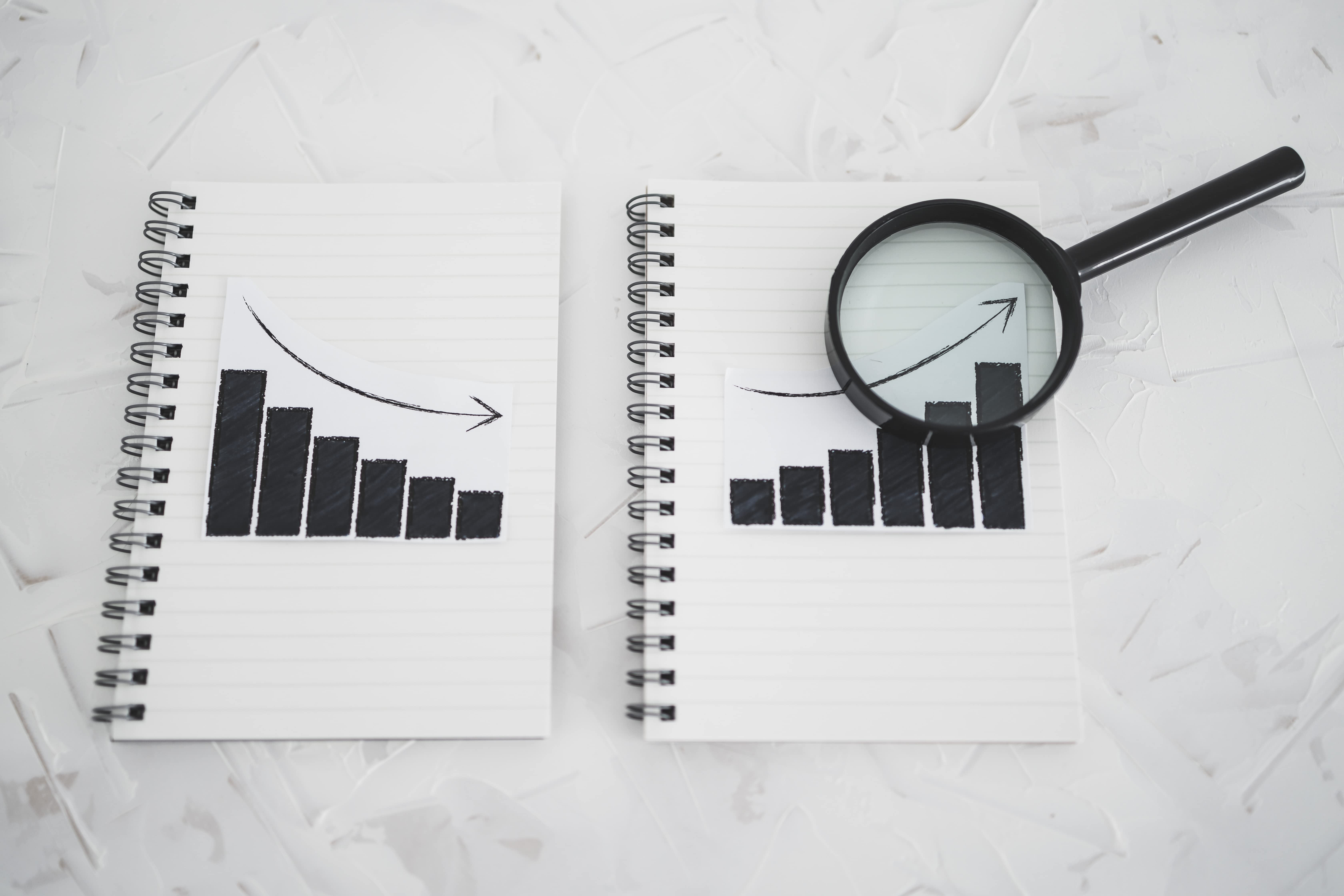 Image of a graph drawn on paper that has an upward trend, used to depict the importance of catching a product trend that's rising.